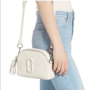 Marc Jacob’s white cross body shutter bag